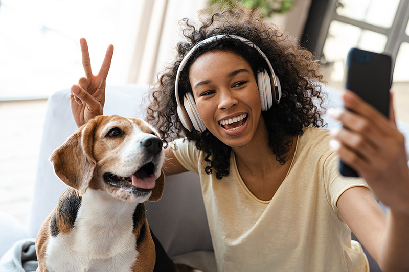 Dog and Woman Smiling for Selfie