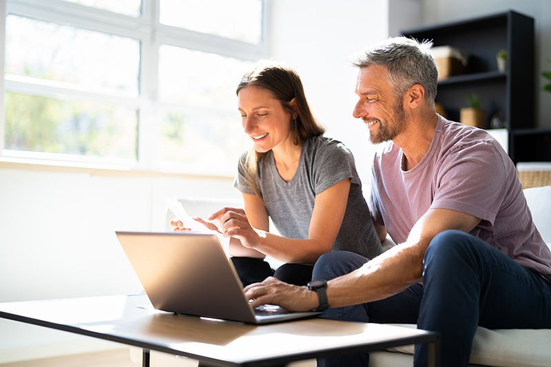 couple reviewing their dental insurance savings