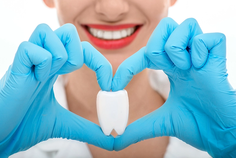 dentist explaining link between heart disease and gum disease