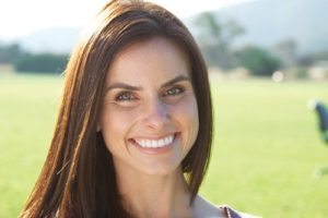 Woman smiling outside