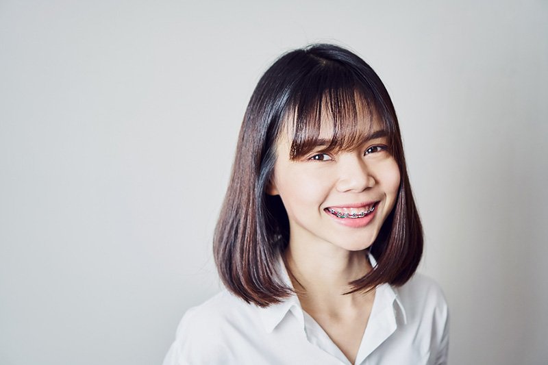 Young woman with braces